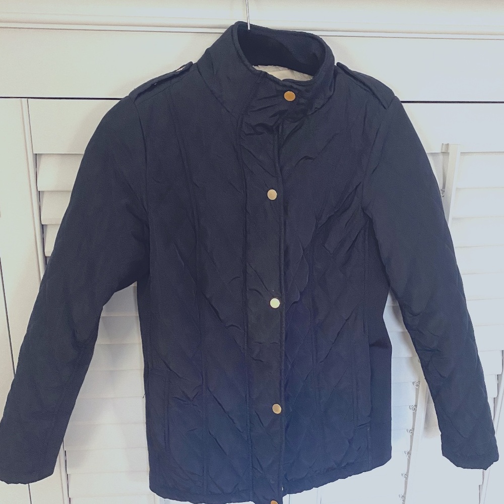 Black zip up jacket with gold snaps